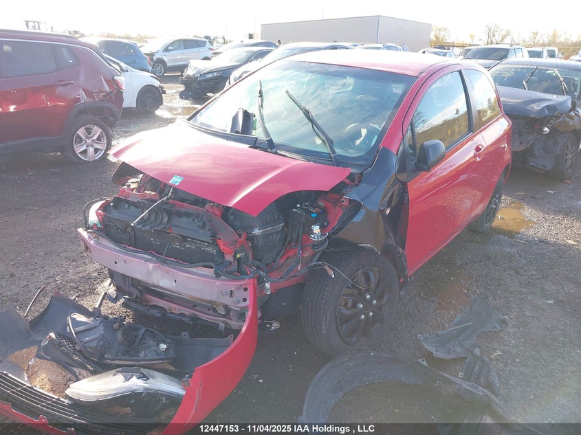 2009 Toyota Yaris Ce/Rs VIN: JTDJT923895257897 Lot: 12447153