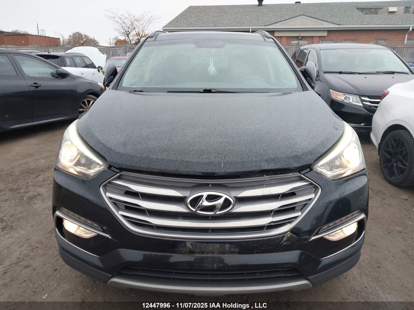 5NMZUDLB8JH060349 2018 HYUNDAI SANTA FE photo no. 12