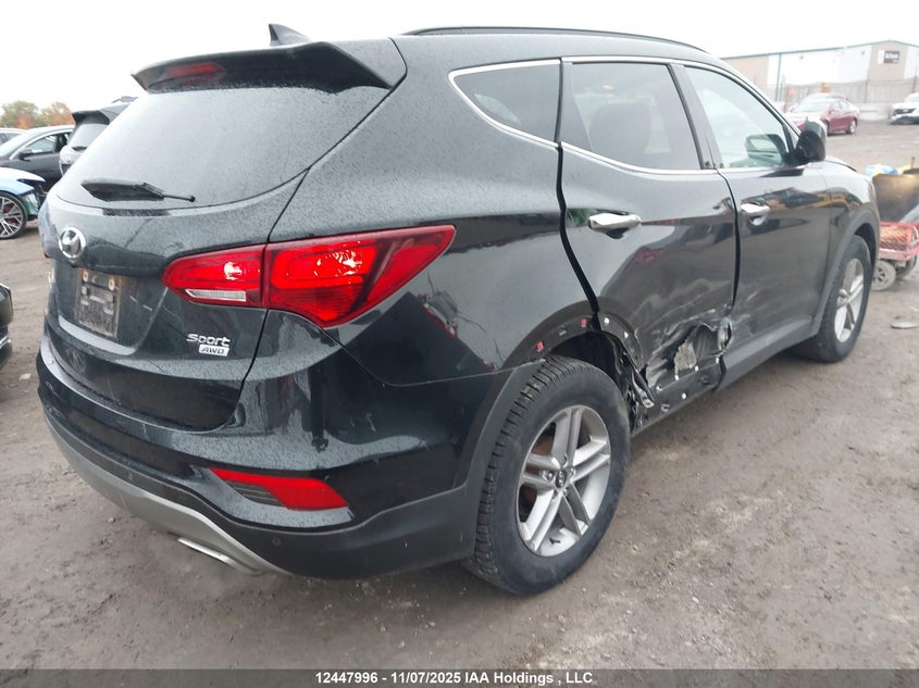 5NMZUDLB8JH060349 2018 HYUNDAI SANTA FE photo no. 4