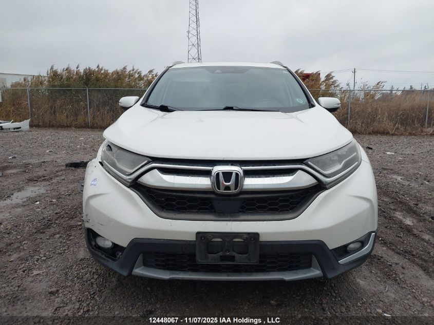 2017 Honda Cr-V Touring VIN: 2HKRW2H93HH141017 Lot: 12448067