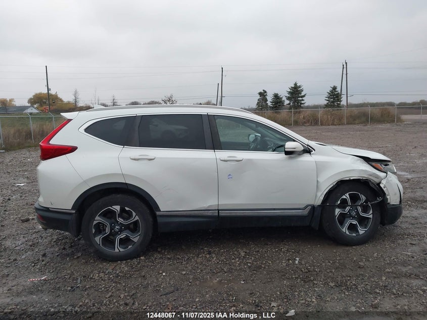 2017 Honda Cr-V Touring VIN: 2HKRW2H93HH141017 Lot: 12448067