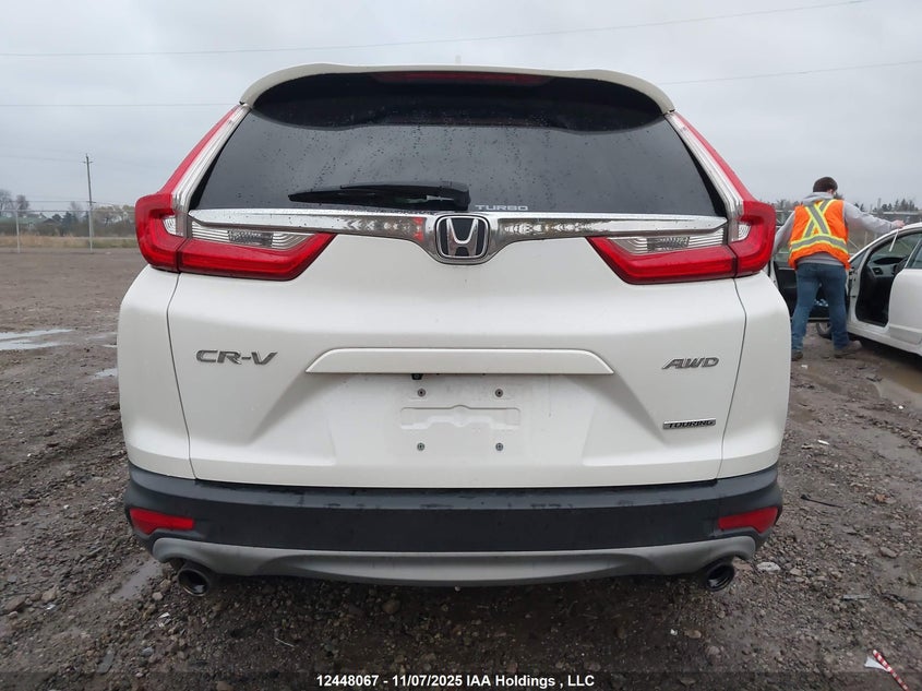 2017 Honda Cr-V Touring VIN: 2HKRW2H93HH141017 Lot: 12448067