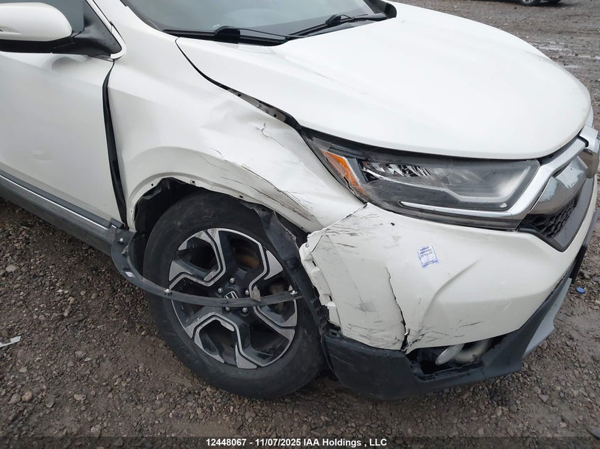 2017 Honda Cr-V Touring VIN: 2HKRW2H93HH141017 Lot: 12448067
