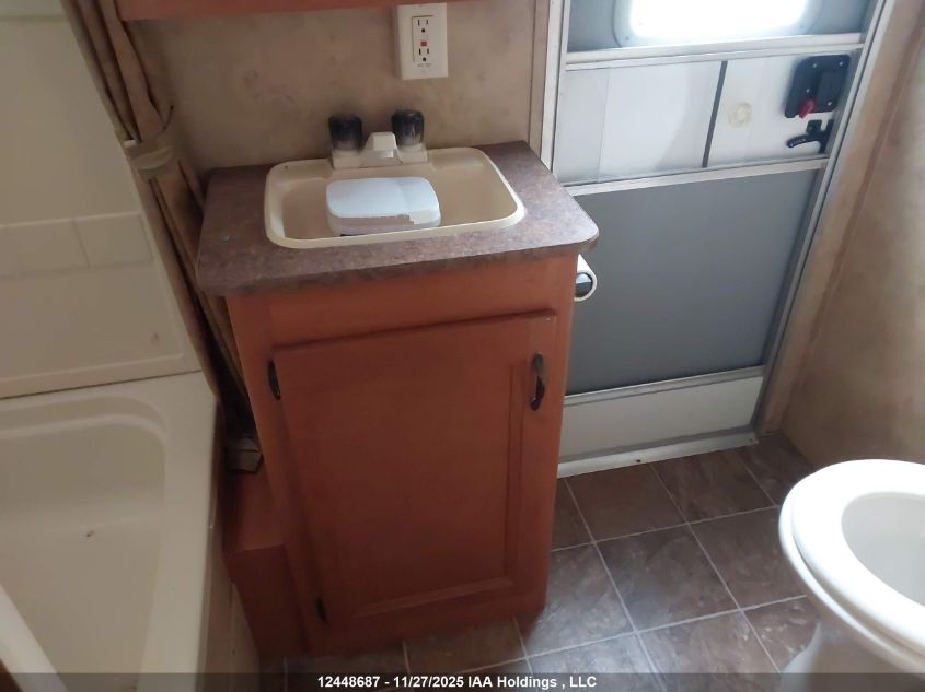 2010 Keystone Keystone VIN: 4YDT31R25A7202157 Lot: 12448687