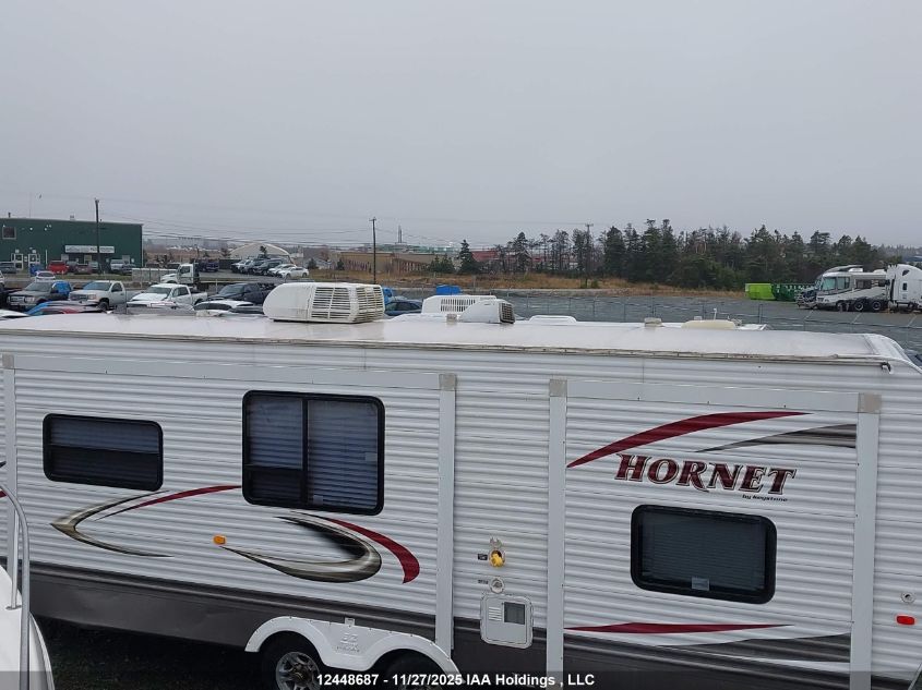 2010 Keystone Keystone VIN: 4YDT31R25A7202157 Lot: 12448687