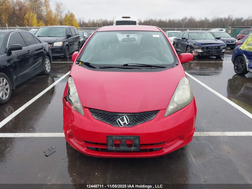 2009 Honda Fit Lx VIN: JHMGE88569S803653 Lot: 12448711