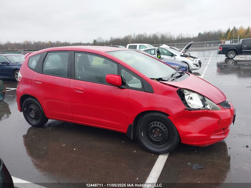 2009 Honda Fit Lx VIN: JHMGE88569S803653 Lot: 12448711