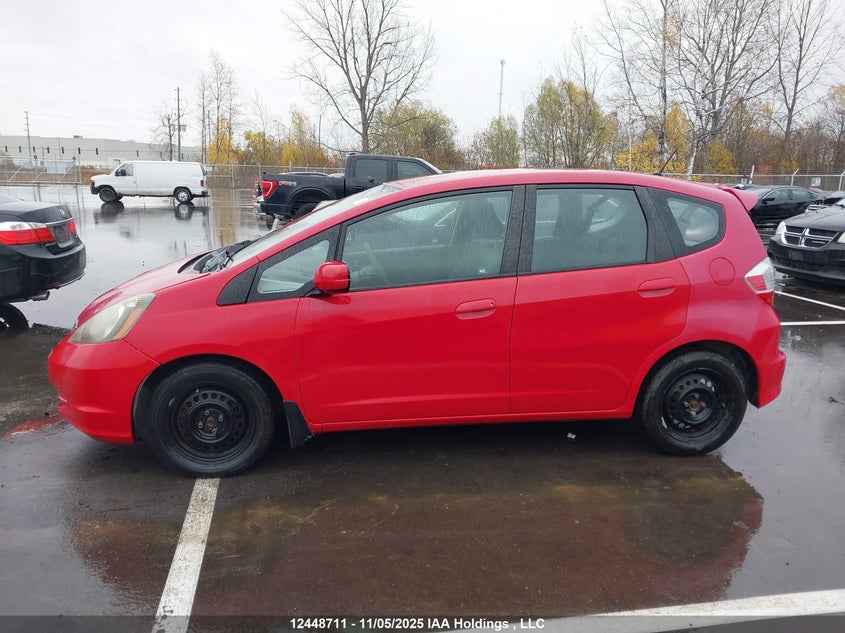 2009 Honda Fit Lx VIN: JHMGE88569S803653 Lot: 12448711