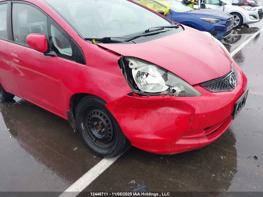 2009 Honda Fit Lx VIN: JHMGE88569S803653 Lot: 12448711