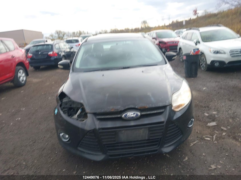 1FAHP3F23CL306059 2012 FORD FOCUS photo no. 13