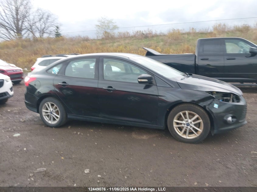 1FAHP3F23CL306059 2012 FORD FOCUS photo no. 14