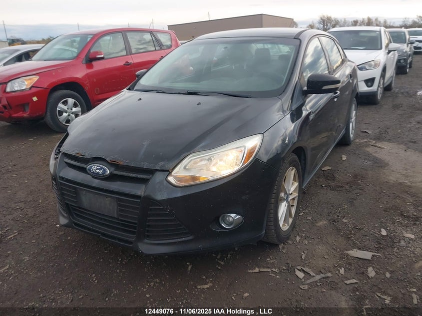 1FAHP3F23CL306059 2012 FORD FOCUS photo no. 2