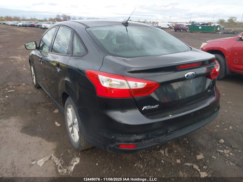 1FAHP3F23CL306059 2012 FORD FOCUS photo no. 3