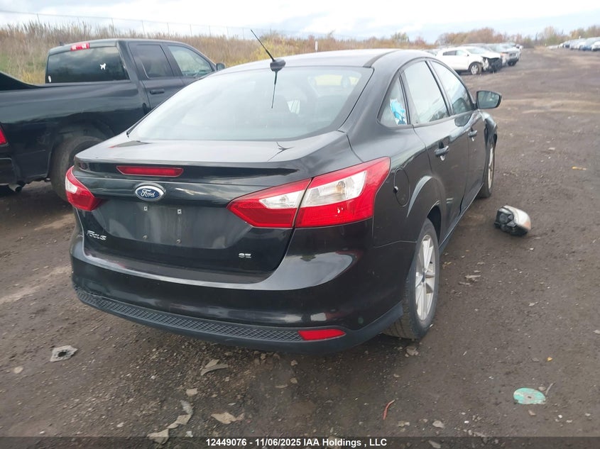 1FAHP3F23CL306059 2012 FORD FOCUS photo no. 4