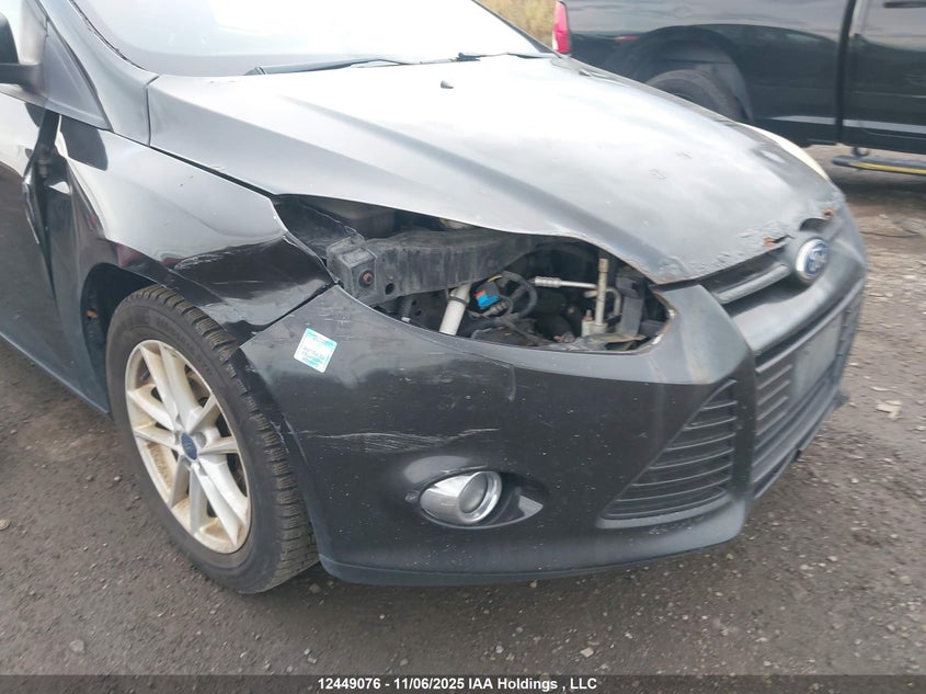 1FAHP3F23CL306059 2012 FORD FOCUS photo no. 6