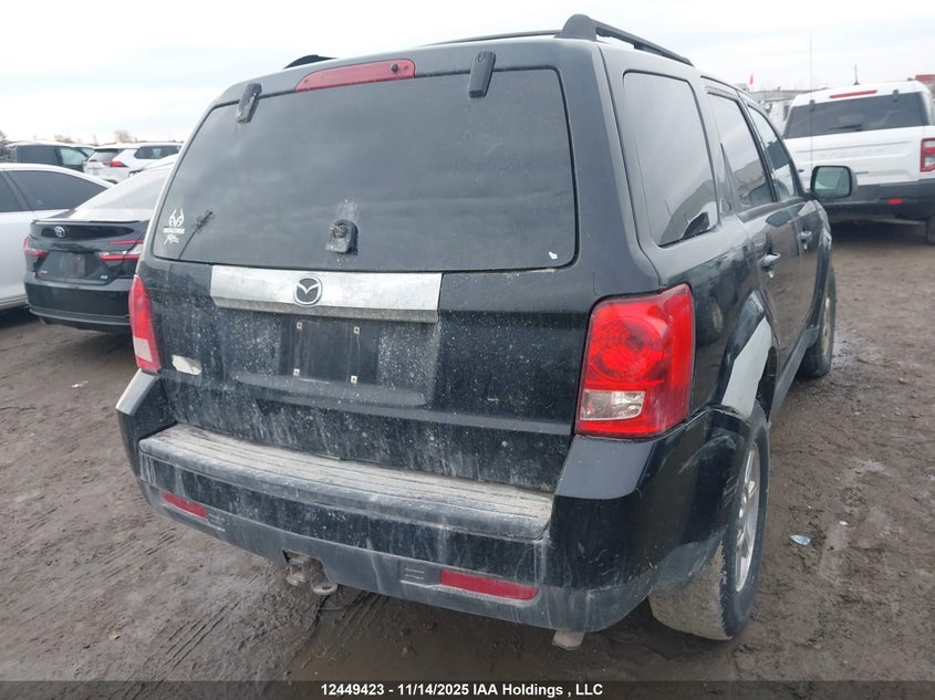 4F2CZ96G59KM08586 2009 MAZDA TRIBUTE photo no. 4