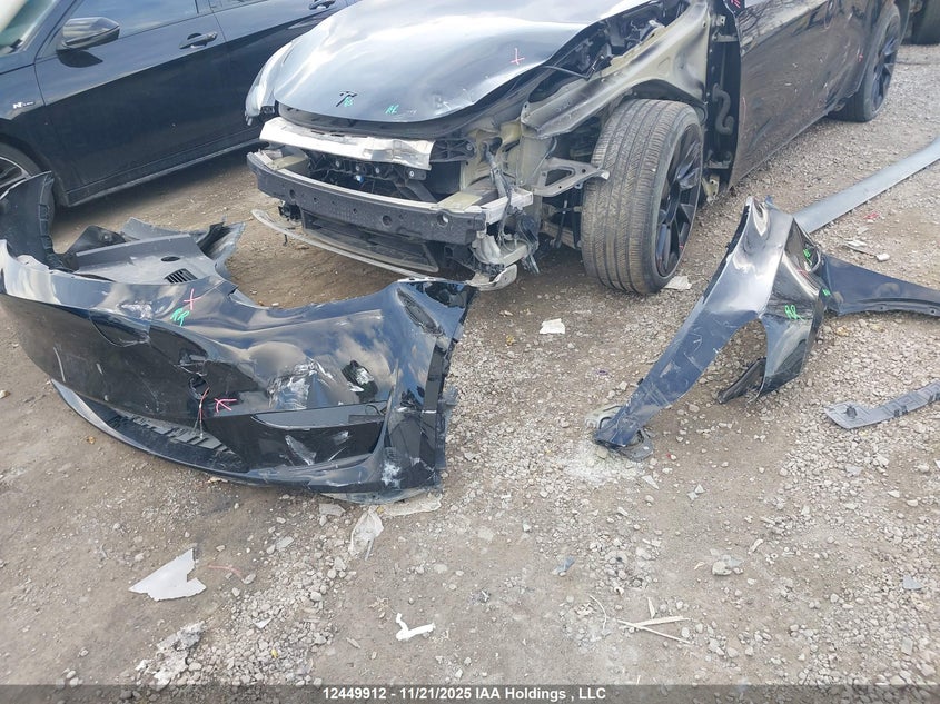 2023 Tesla Model Y Long Range VIN: 7SAYGDEE2PF763890 Lot: 12449912