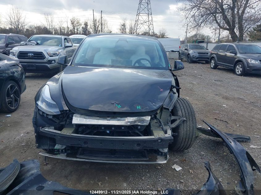 2023 Tesla Model Y Long Range VIN: 7SAYGDEE2PF763890 Lot: 12449912