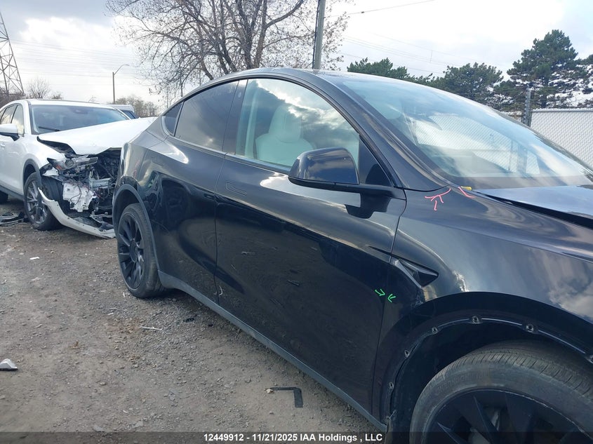 2023 Tesla Model Y Long Range VIN: 7SAYGDEE2PF763890 Lot: 12449912