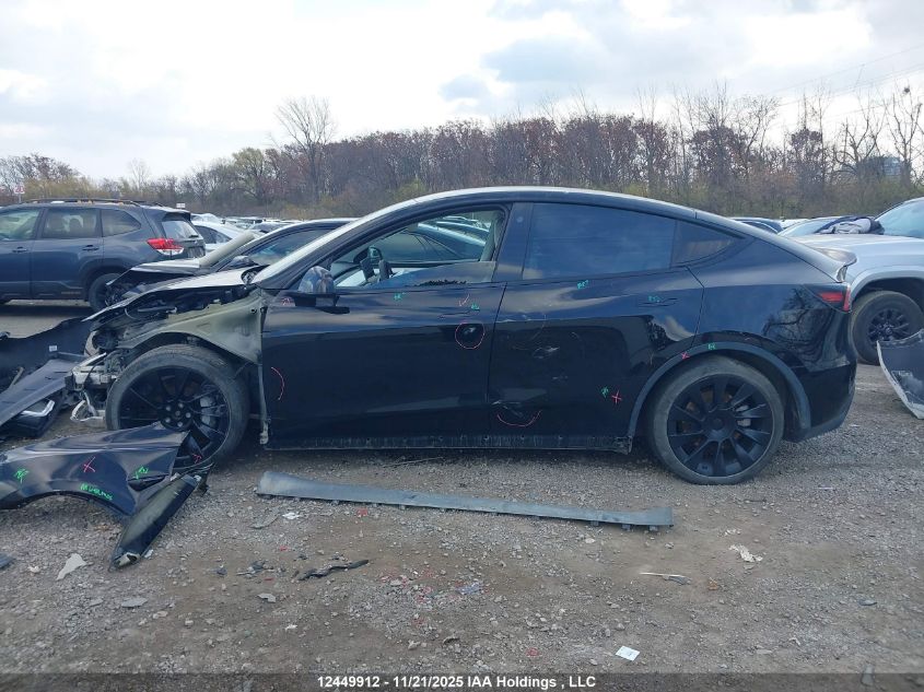 2023 Tesla Model Y Long Range VIN: 7SAYGDEE2PF763890 Lot: 12449912