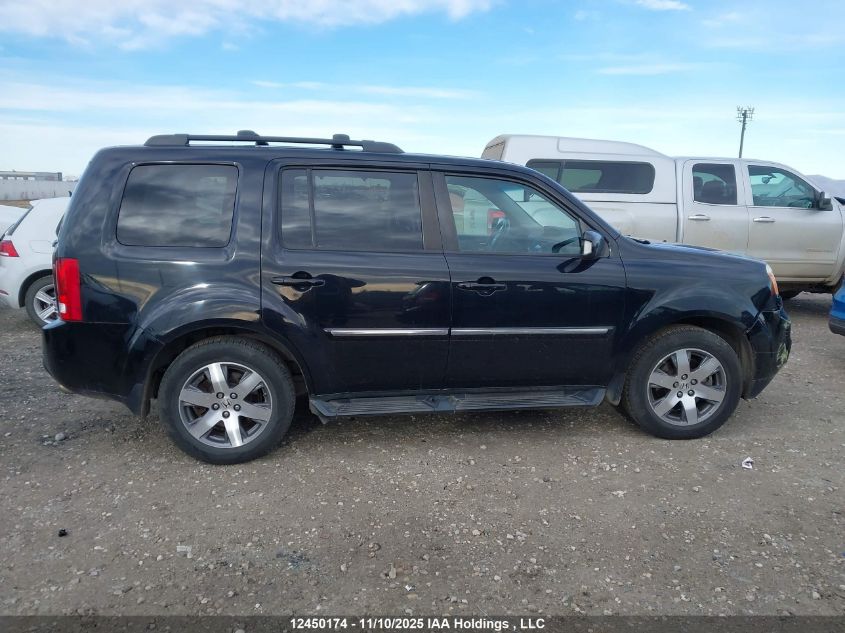 2014 Honda Pilot Touring VIN: 5FNYF4H91EB502701 Lot: 12450174