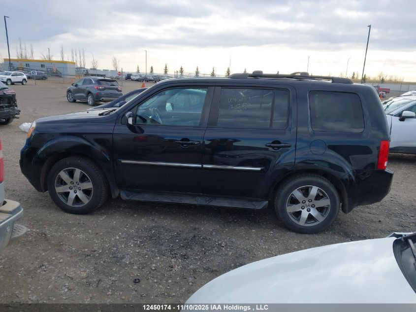 2014 Honda Pilot Touring VIN: 5FNYF4H91EB502701 Lot: 12450174