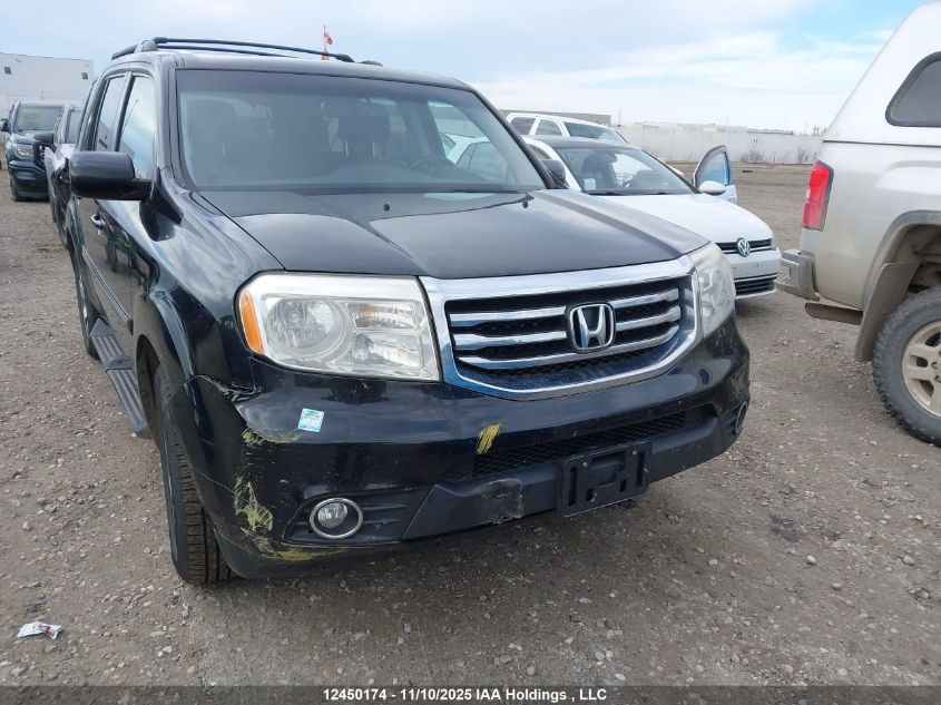 2014 Honda Pilot Touring VIN: 5FNYF4H91EB502701 Lot: 12450174