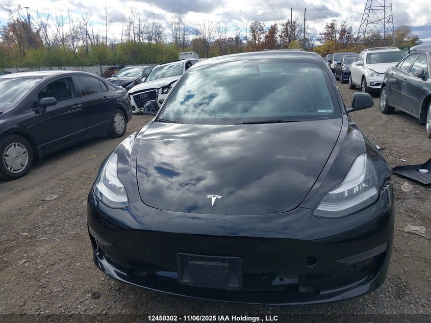 2022 Tesla Model 3 VIN: 5YJ3E1EB9NF277169 Lot: 12450302