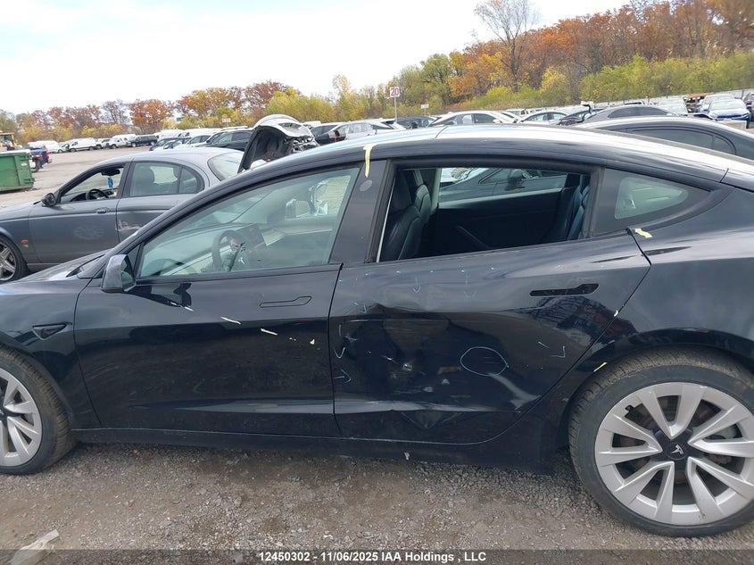 2022 Tesla Model 3 VIN: 5YJ3E1EB9NF277169 Lot: 12450302