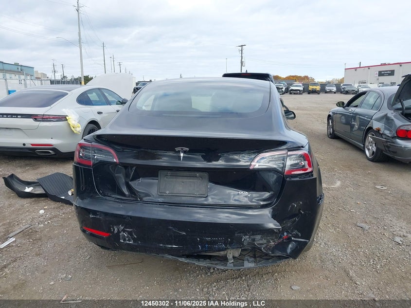 2022 Tesla Model 3 VIN: 5YJ3E1EB9NF277169 Lot: 12450302