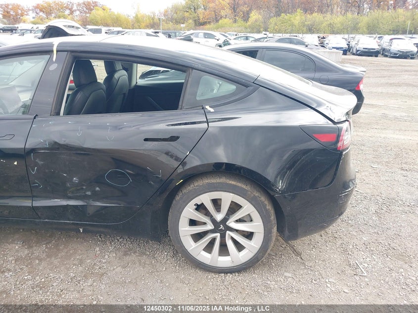 2022 Tesla Model 3 VIN: 5YJ3E1EB9NF277169 Lot: 12450302