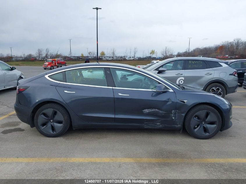 2019 Tesla Model 3 VIN: 5YJ3E1EA3KF411290 Lot: 12450707