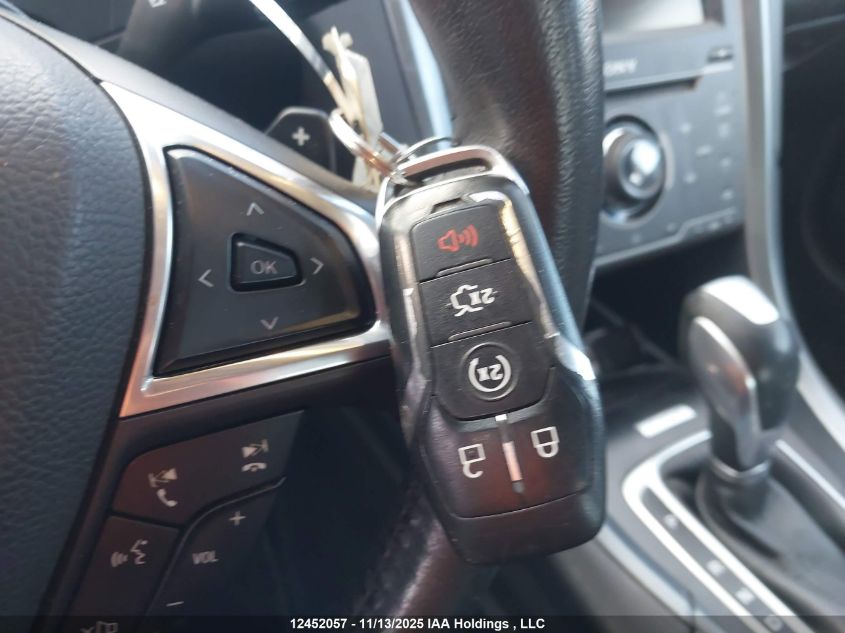 2015 Ford Fusion Titanium VIN: 3FA6P0D90FR284971 Lot: 12452057