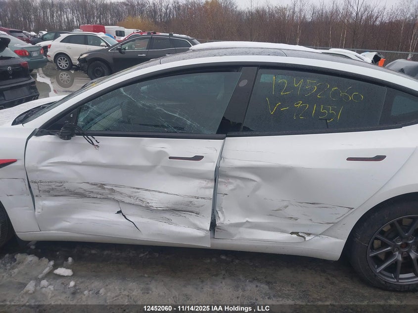 2023 Tesla Model 3 Long Range VIN: LRW3E1EBXPC921551 Lot: 12452060