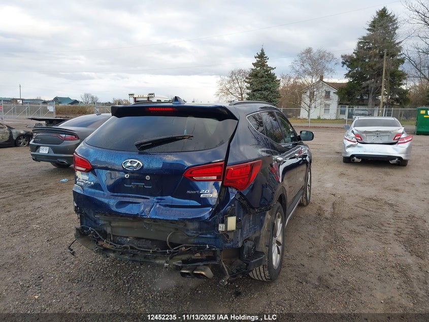 5XYZUDLA5JG552368 2018 HYUNDAI SANTA FE photo no. 4