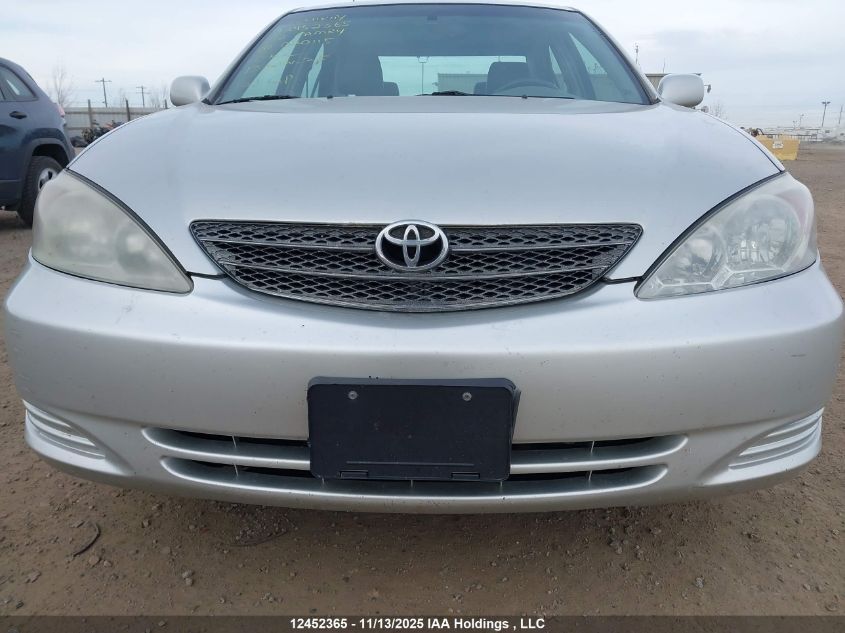 2002 Toyota Camry Le/Xle VIN: JTDBE30K520020115 Lot: 12452365