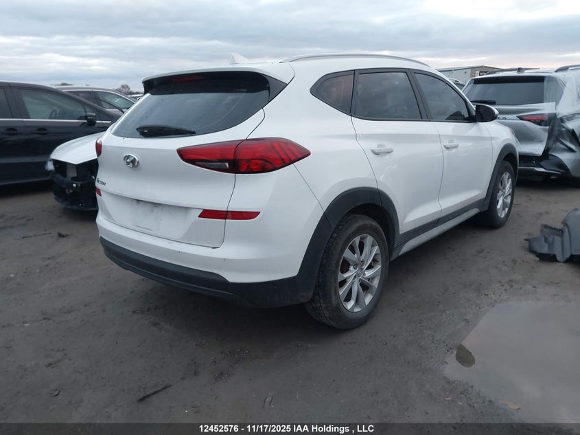 KM8J33A40KU852631 2019 HYUNDAI TUCSON photo no. 4