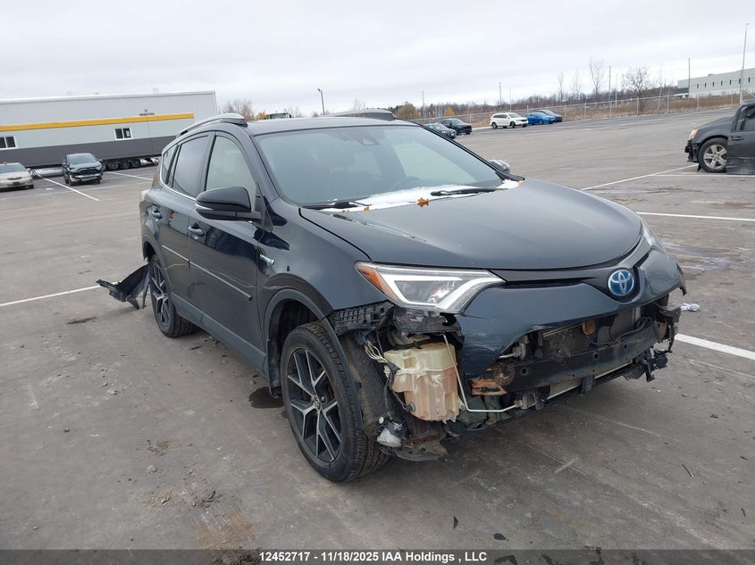 JTMJJREV2JD247492 2018 Toyota Rav4 Hv Se auction photo 1