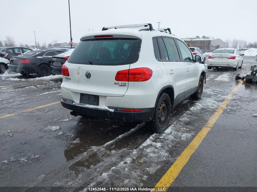 WVGJV7AX8FW572106 2015 VOLKSWAGEN TIGUAN photo no. 4