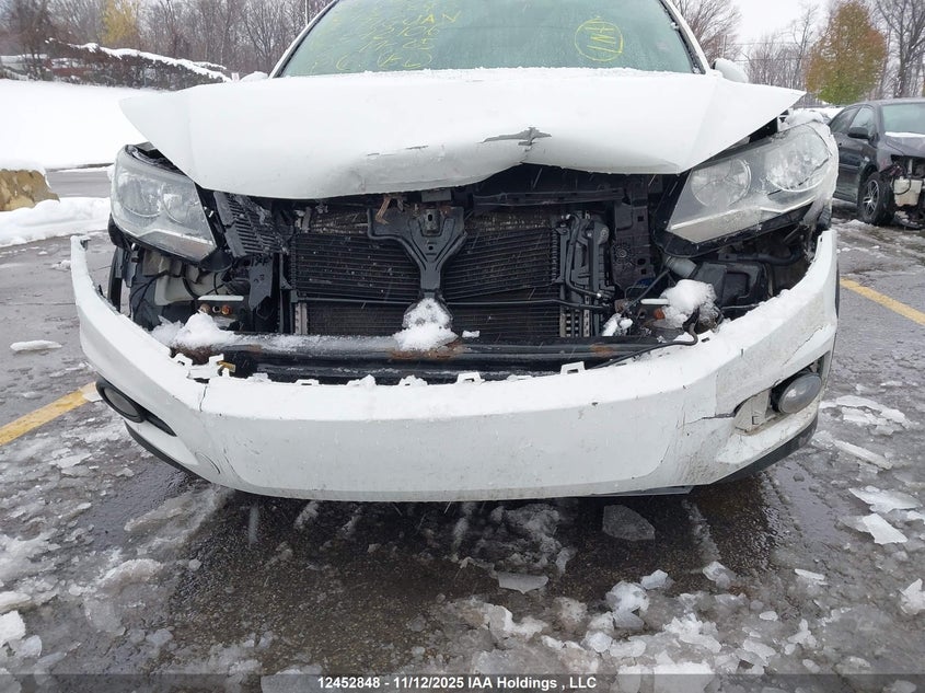 WVGJV7AX8FW572106 2015 VOLKSWAGEN TIGUAN photo no. 6