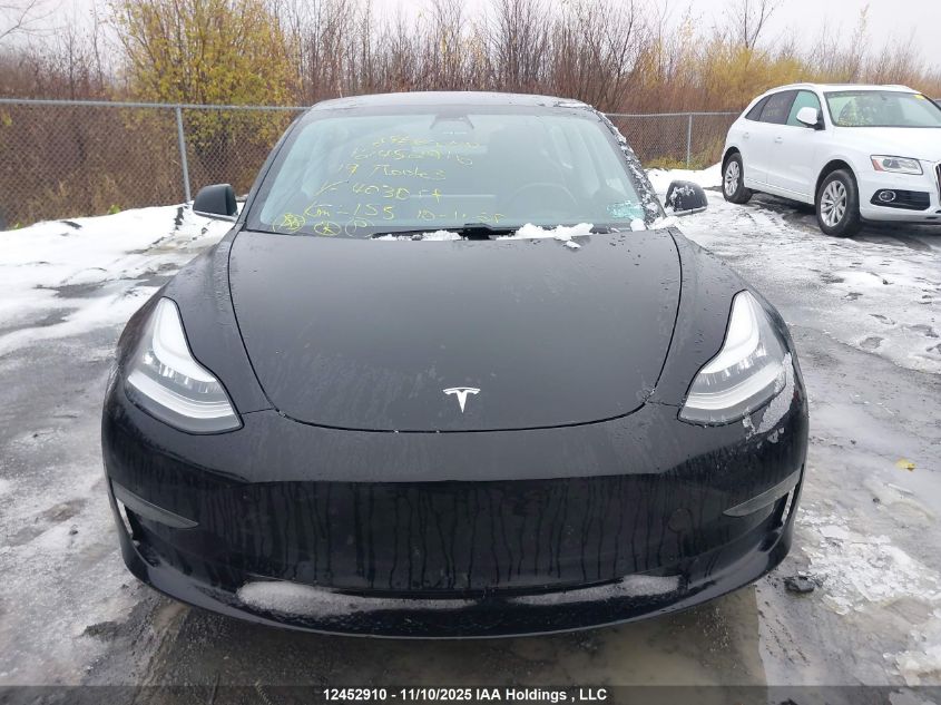 2019 Tesla Model 3 VIN: 5YJ3E1EA0KF403017 Lot: 12452910