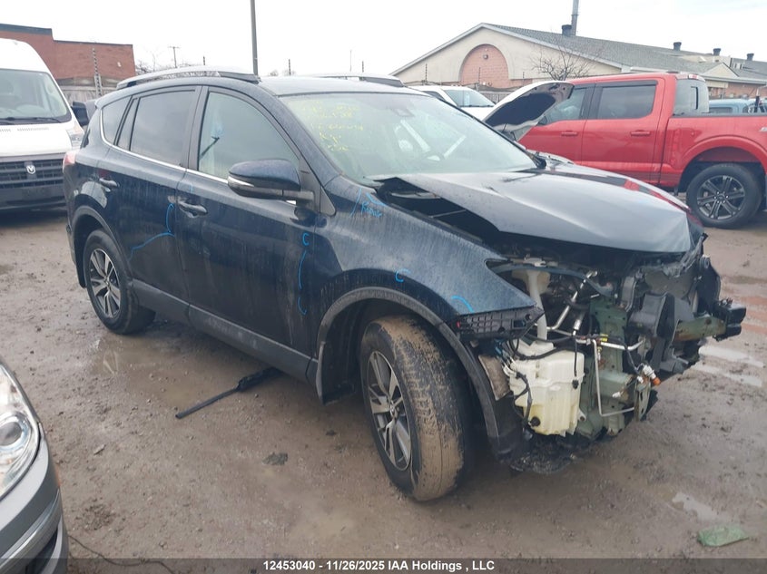 2T3RFREV6JW806128 2018 Toyota Rav4 Xle auction photo 1