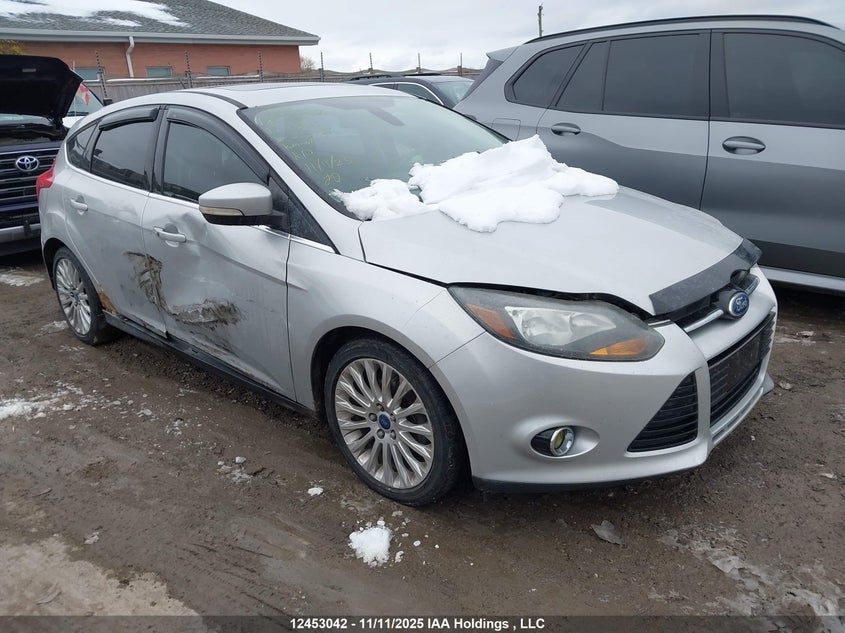 1FAHP3N23CL335028 2012 Ford Focus Titanium auction photo 1