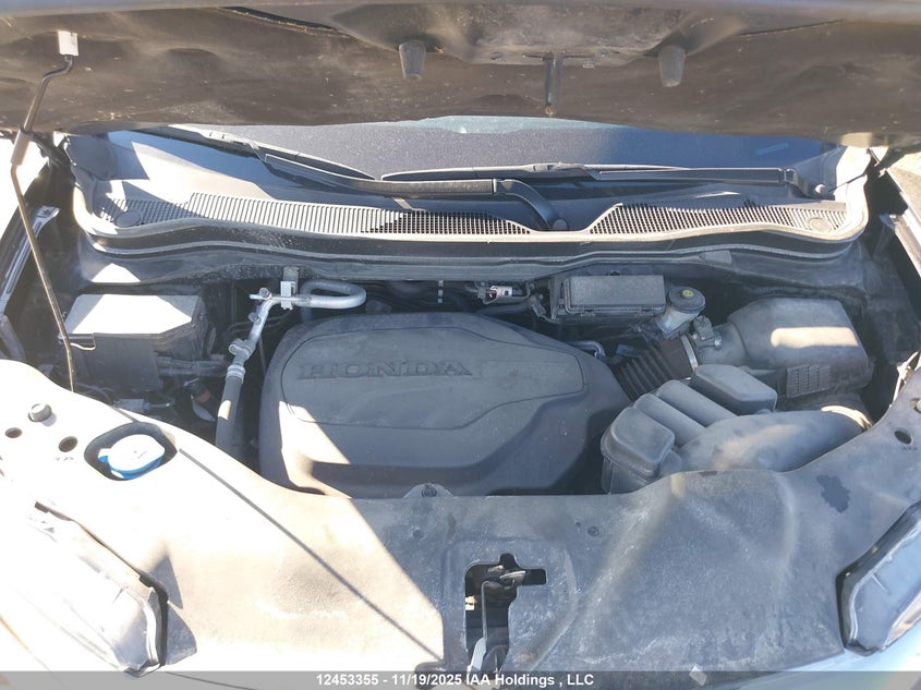 2021 Honda Pilot Touring 8P VIN: 5FNYF6H95MB504770 Lot: 12453355