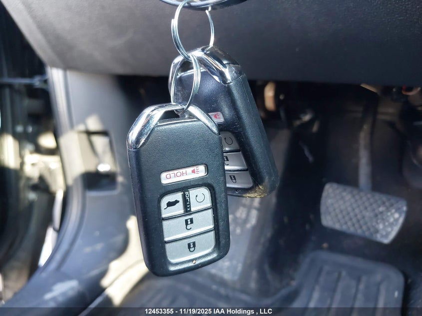 2021 Honda Pilot Touring 8P VIN: 5FNYF6H95MB504770 Lot: 12453355