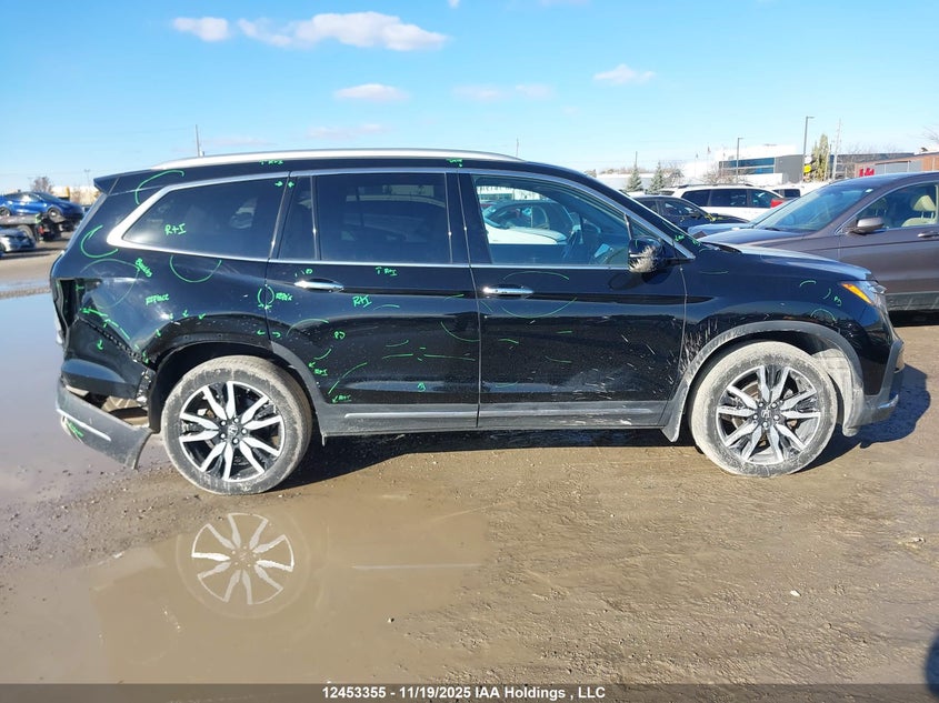 2021 Honda Pilot Touring 8P VIN: 5FNYF6H95MB504770 Lot: 12453355