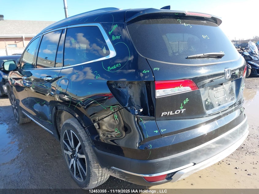 2021 Honda Pilot Touring 8P VIN: 5FNYF6H95MB504770 Lot: 12453355
