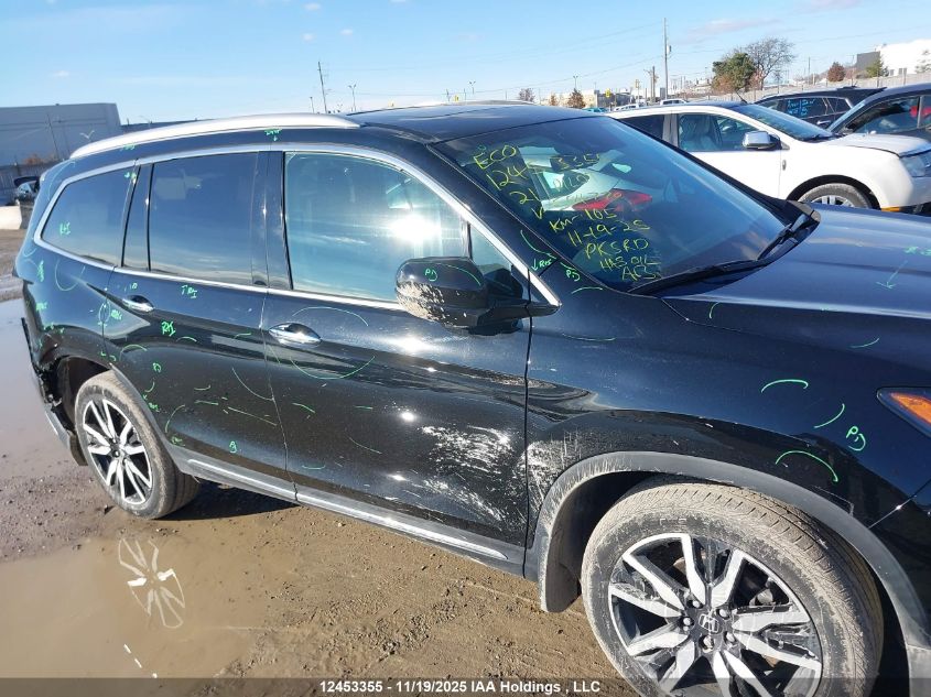2021 Honda Pilot Touring 8P VIN: 5FNYF6H95MB504770 Lot: 12453355