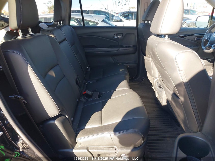 2021 Honda Pilot Touring 8P VIN: 5FNYF6H95MB504770 Lot: 12453355