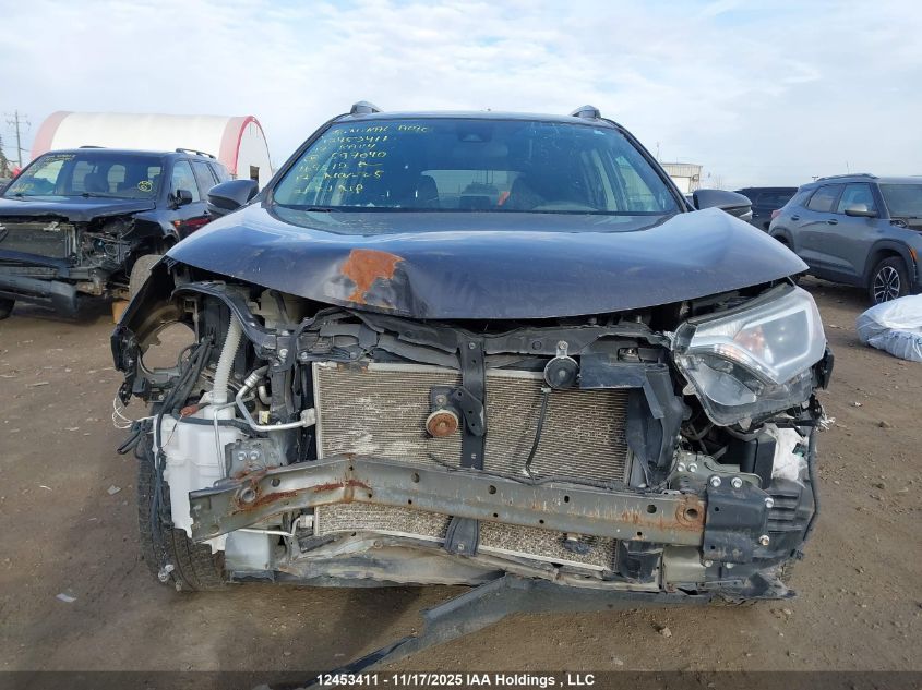 2017 Toyota Rav4 Le VIN: 2T3BFREV3HW597040 Lot: 12453411